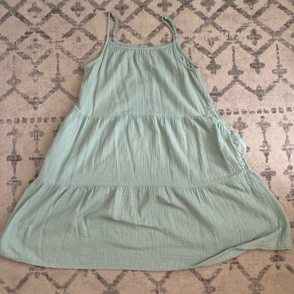 Target spaghetti strap dress. Hits at knee. Super comfy and has pockets too!